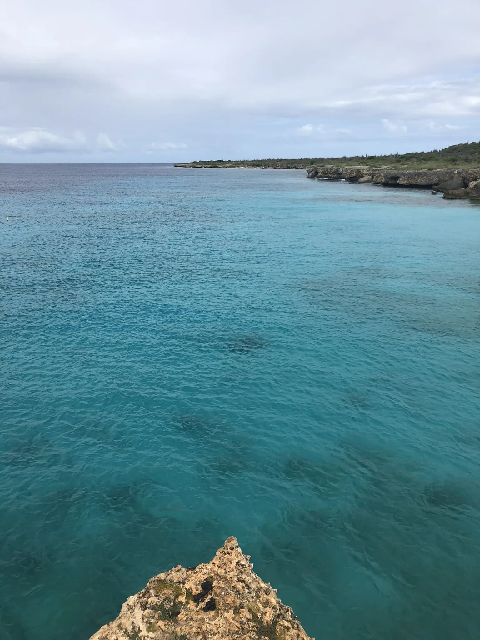 Turquoise water in een baai van Washington Slagbaai